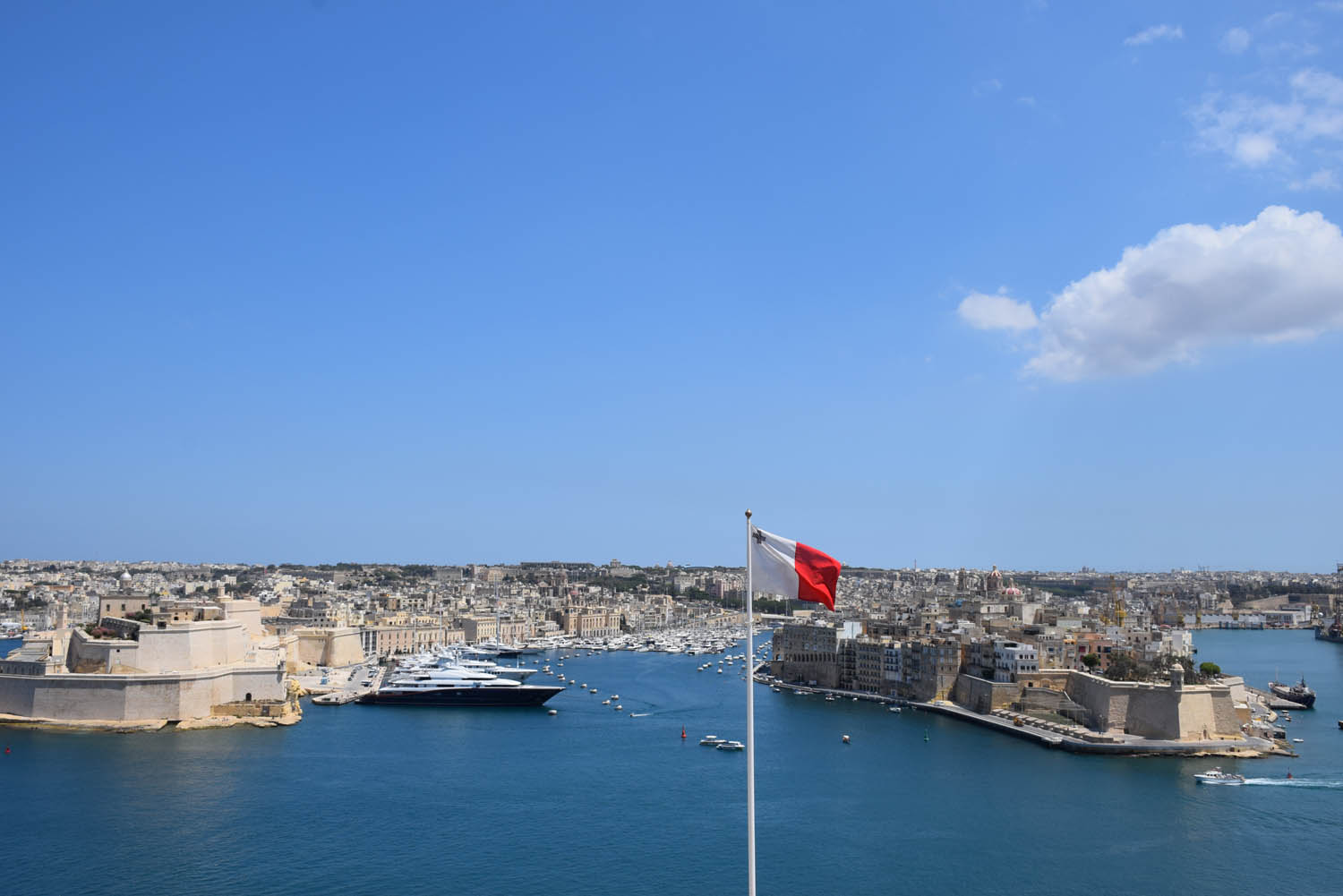 Flag of Malta, which has the cross of St. George - View of the Upper Barrakka Gardens in Valletta